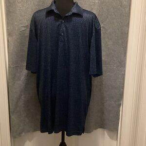 Greg Norman Collection Deep Blue Polo Shirt.  (B6)